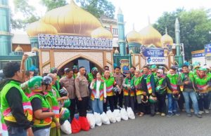 KETUM KOJIRA RUDI ZULHAM HASIBUAN BERSAMA BENDAHARA DPD. GERINDRA SUMATRA UTARA BUNDA YIN PIMPIN AKSI SOSIAL DAN KONVOI DI KOTA MEDAN